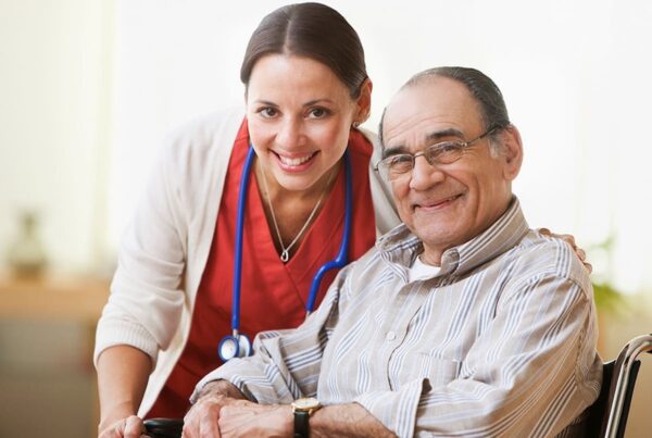 A nurse enjoys spending time with a resident