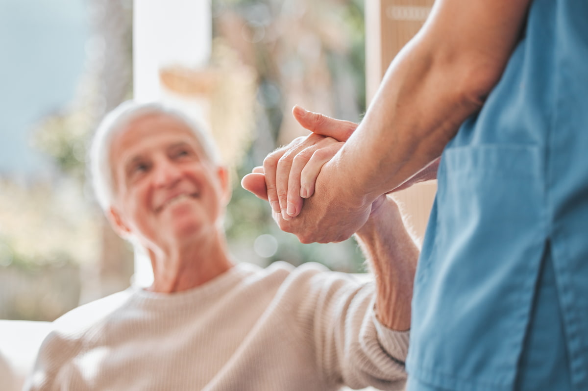 Joyful resident with caregiver