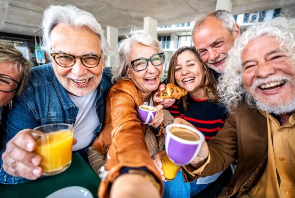 A group of senior adults enjoying snacks and drinks together